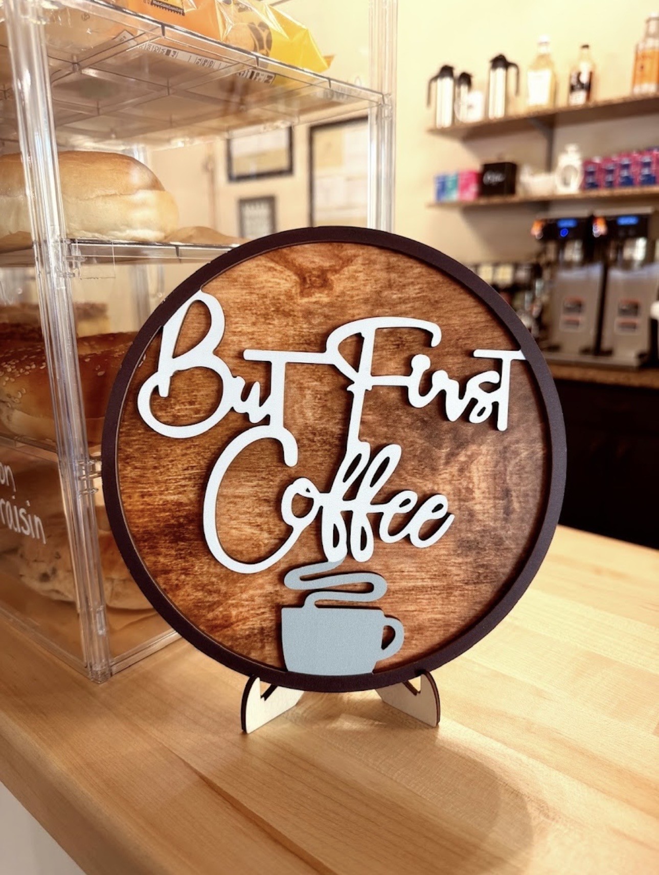 Wooden But First Coffee sign at Coffee Hub